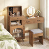 Vanity desk with a 360-degree rotatable mirror, storage drawers, and adjustable lighting for personalized makeup application.
