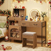 Vanity desk with a 360-degree rotatable mirror, storage drawers, and adjustable lights for personalized makeup application.