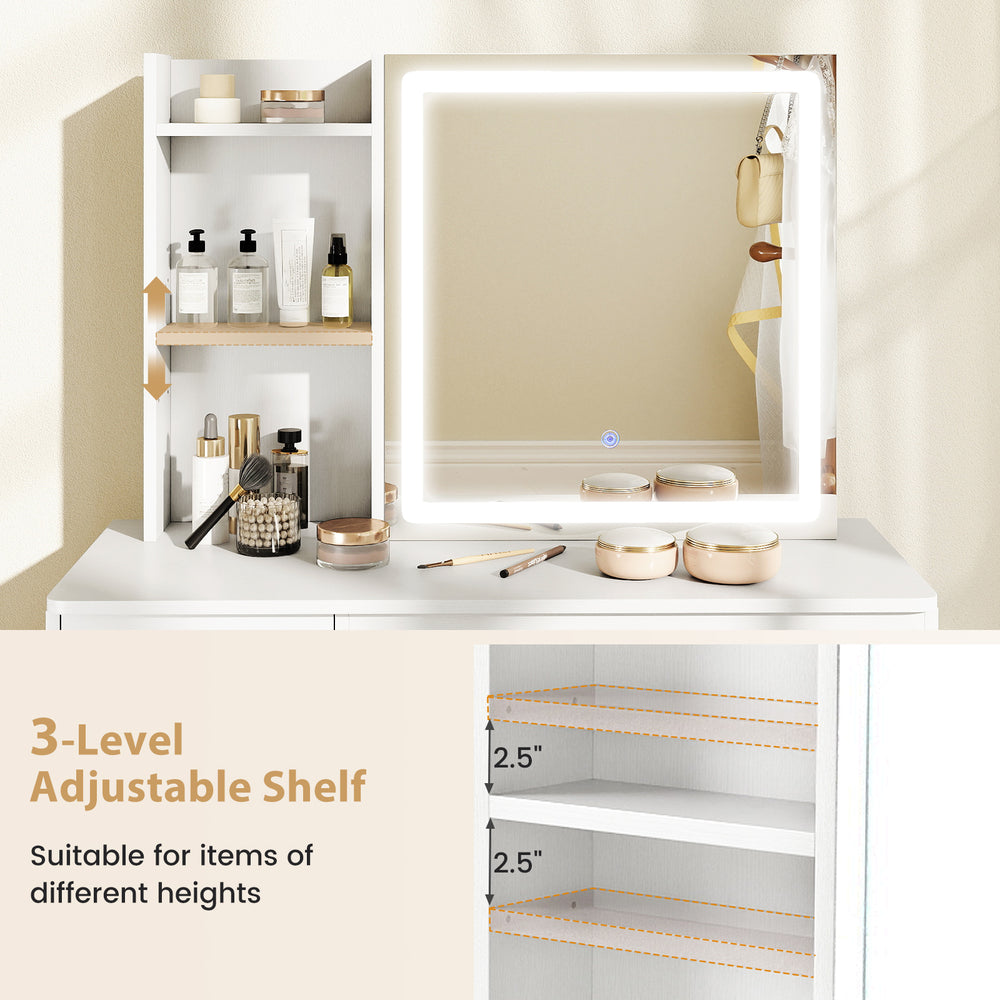 Adjustable 3-level shelf of a white vanity desk with sliding mirror, designed for items of varying heights.