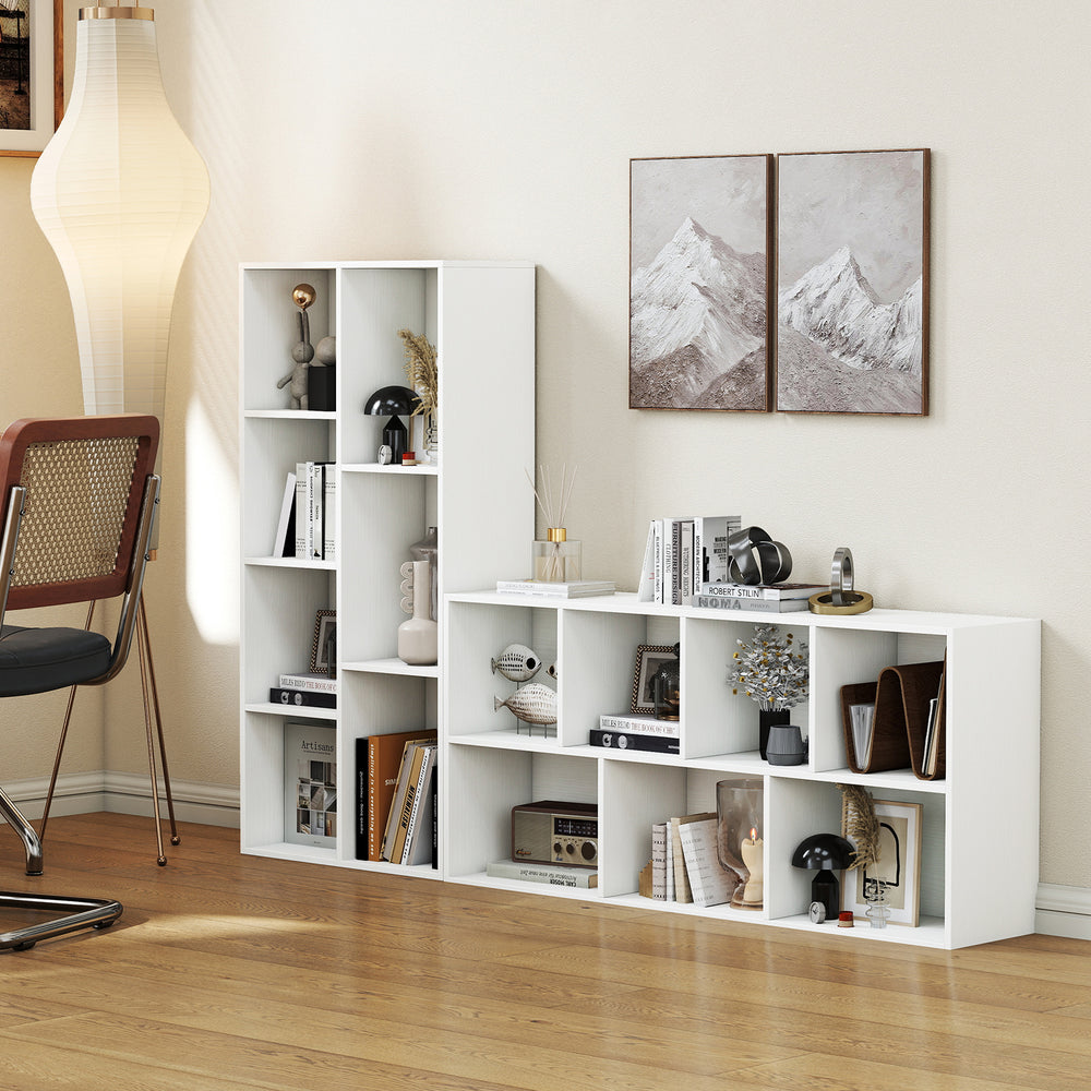 Freestanding white bookshelf with 7 compartments, ideal for displaying books and decor in any room layout.