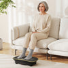 Vibration plate exercise machine in black, featuring a user on it, designed for lymphatic drainage and weight loss.