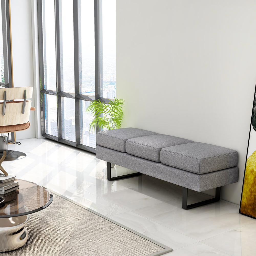 Gray waiting room bench seating with metal frame, removable cushions, and modern design for comfortable reception areas.