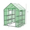Walk-in greenhouse dimensions of 56 x 56 x 77 inches, showcasing internal shelves and roll-up door for easy access.