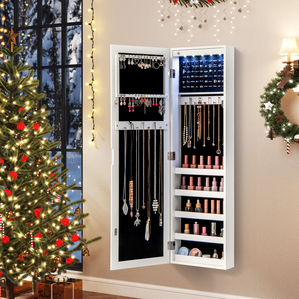 Mirrored jewelry cabinet with LED light, featuring generous storage and soft velvet lining, mounted on a wall beside a.