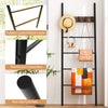 Wall-leaning decorative blanket holder with 5 removable hooks, featuring a powder-coated metal frame and non-slip foot.