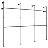 Wall-mounted black pipe clothing rack with 6 hanging rods, designed for durable organization in closets or retail.
