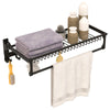 Wall mounted towel shelf showcasing a top storage basket and multiple hooks, designed for easy organization in.