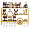 Large wall-mounted wine rack in gold with three shelves, honeycomb cubbies, and glass holder for stylish storage.