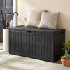 Black waterproof lockable outdoor deck box with cushions, 120 Gal capacity, serving as a bench for outdoor use.