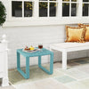 Blue weather-resistant Adirondack outdoor side table with slatted design, perfect for patio or poolside use.