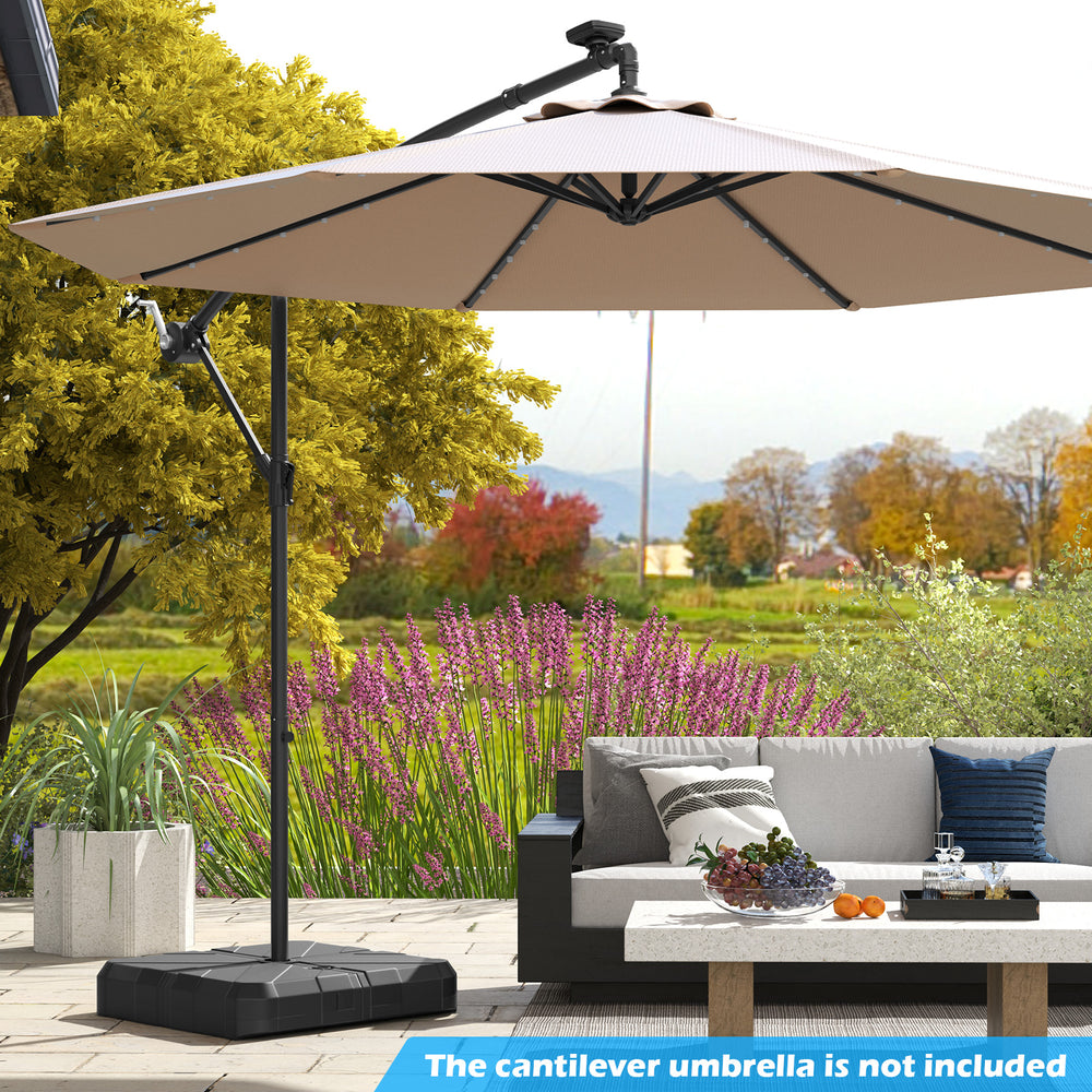 Weighted offset umbrella base with cross bracket, designed for easy movement and stability in outdoor settings.
