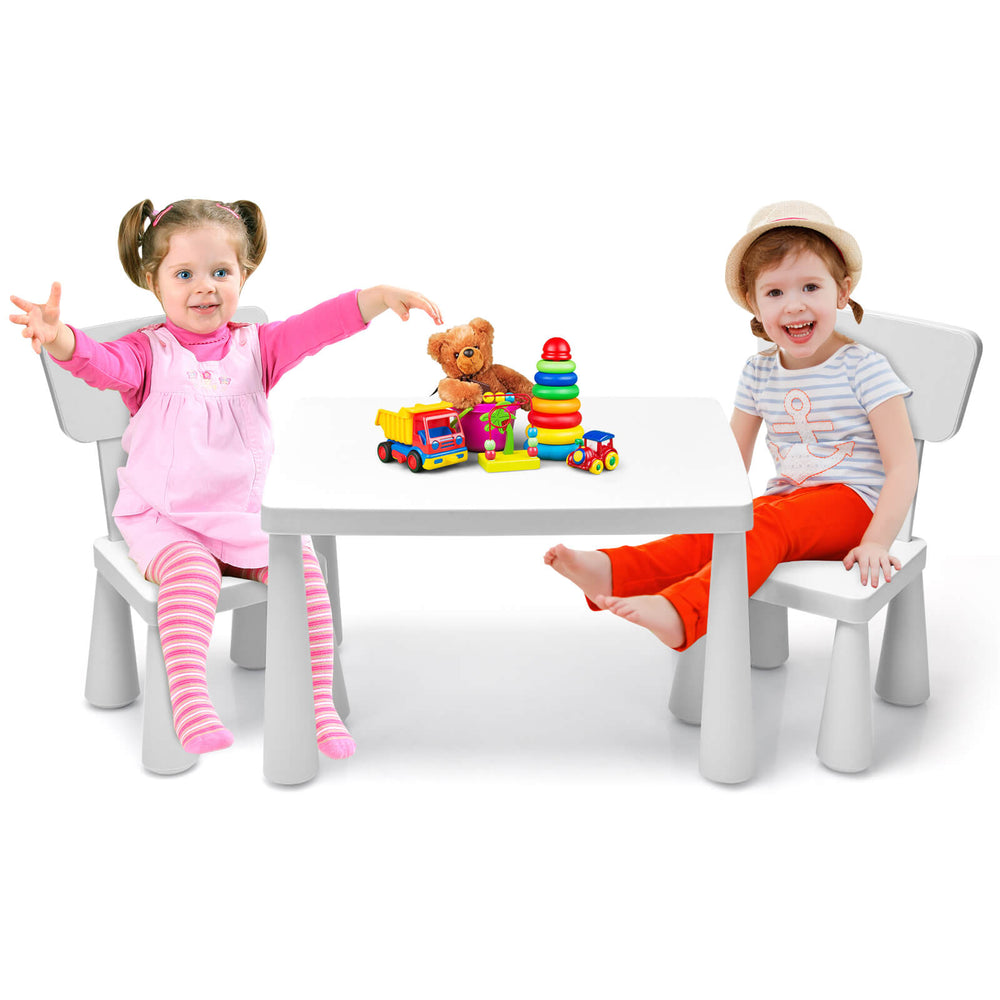 Kids' table and chair set in white, perfect for playtime and study, featuring ergonomic design and round edges for.