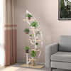 6-tier white metal plant stand with potted plants, featuring a curved design and top hook for hanging ornaments.
