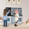 Kids engaging with the toddler pretend play kitchen in white, featuring a blackboard and realistic appliances for.