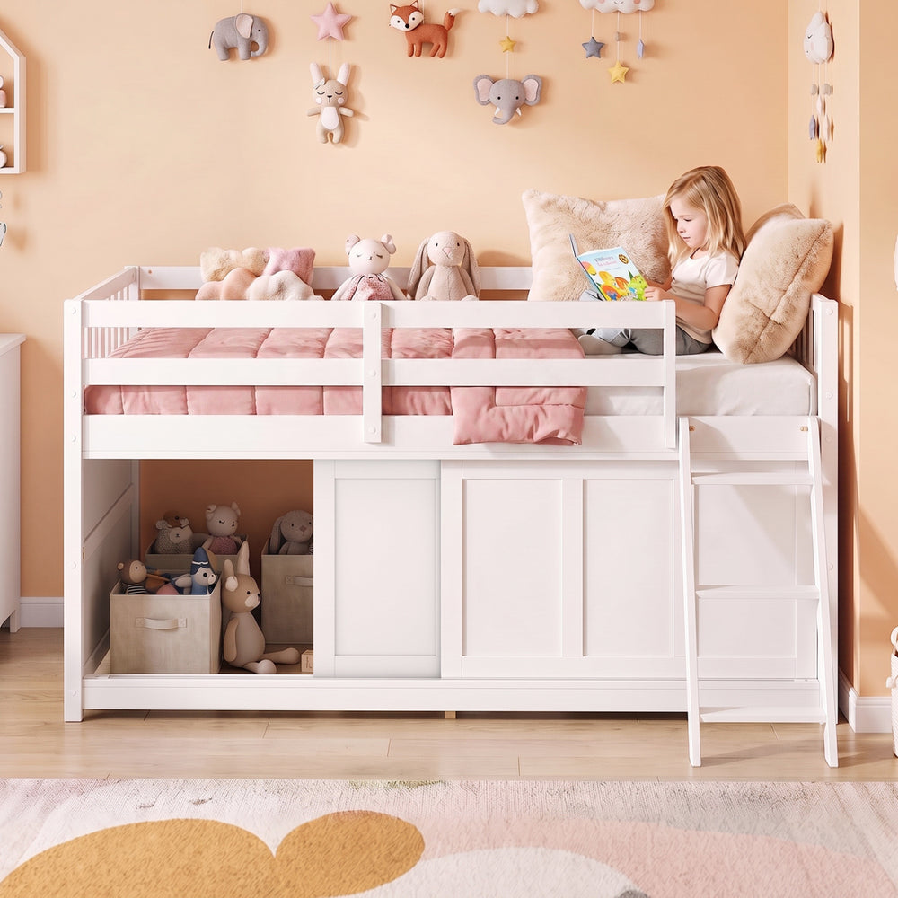 Twin size loft bed in white with solid wood structure, enclosed storage, and safety guardrails for kids' rooms.