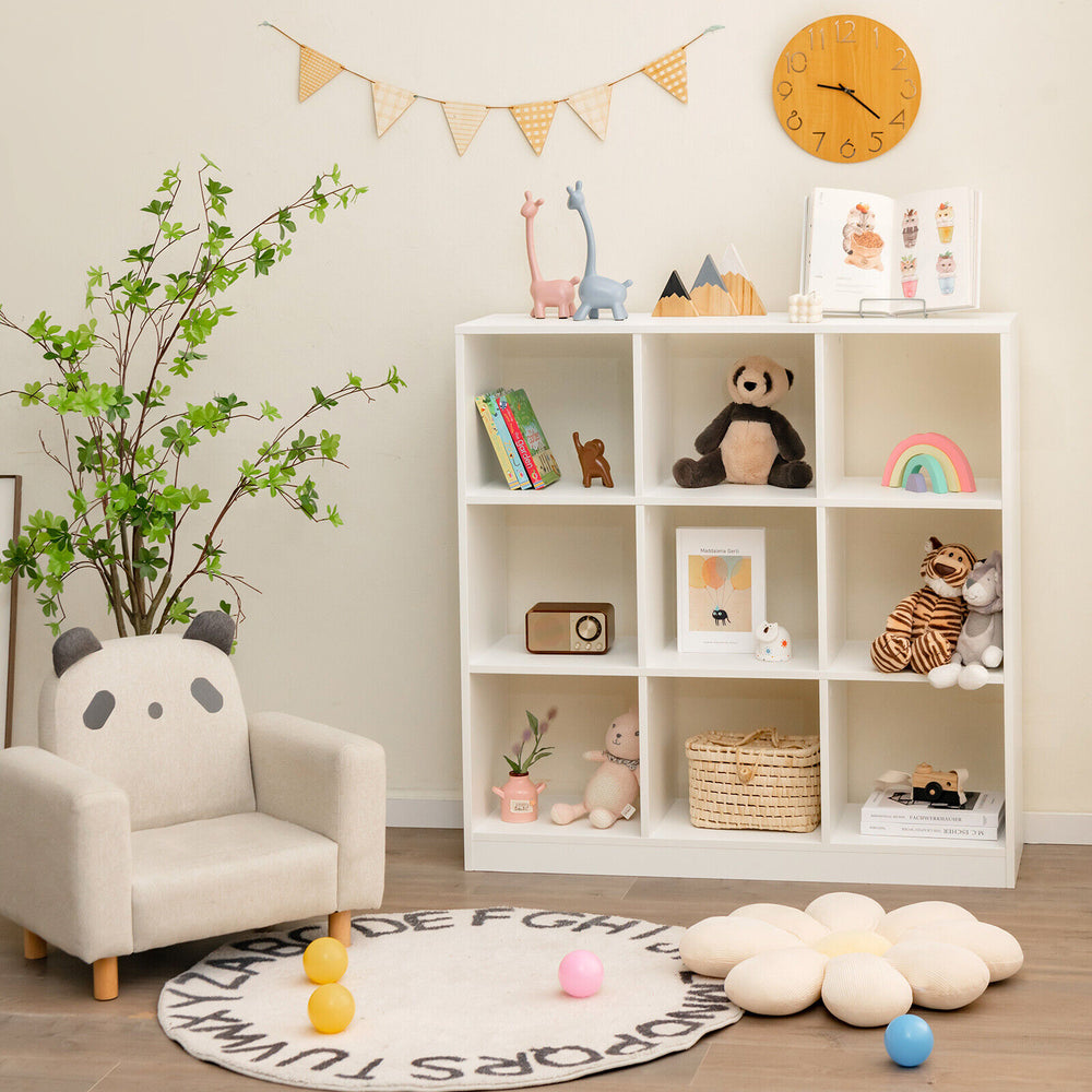 Modern 9-cube bookcase in white with toys and books, ideal for kids' rooms and promoting organization.
