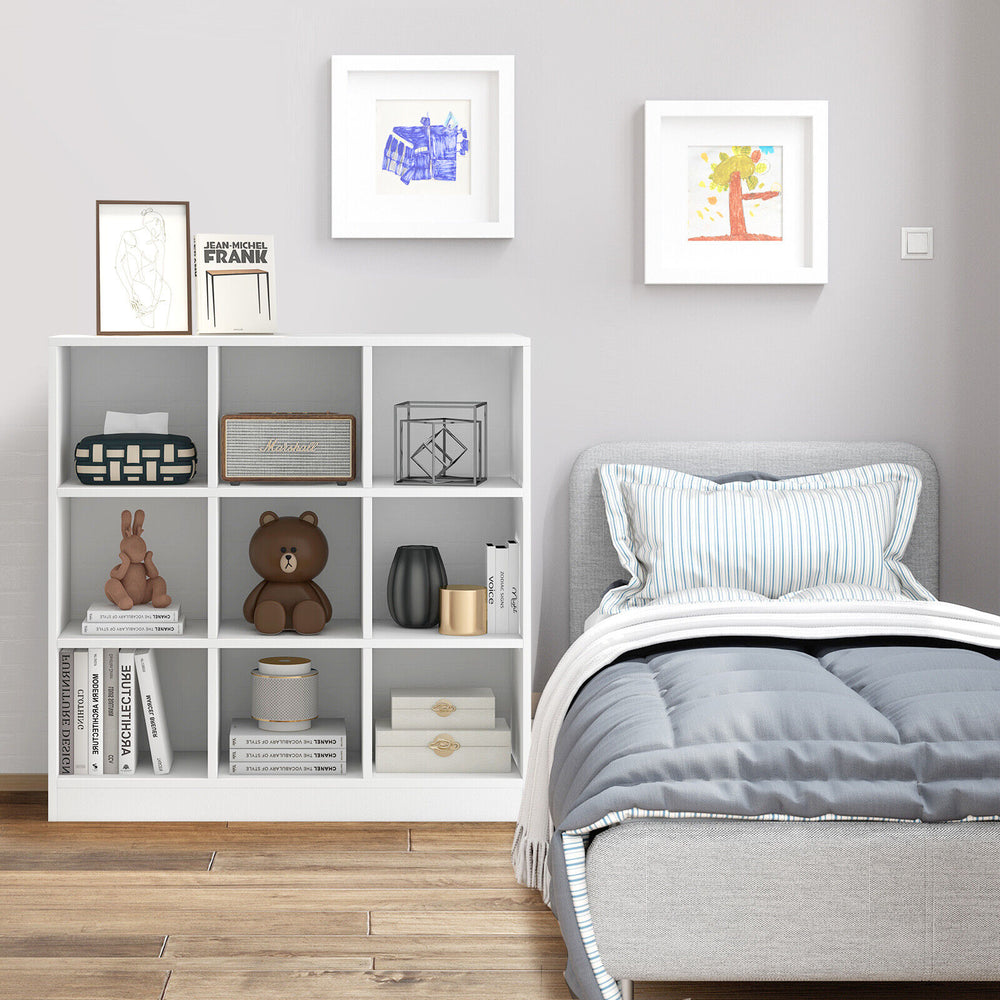 Modern 9-cube bookcase in white, featuring 4 tiers for books and toys, ideal for kids' rooms and easy to clean.