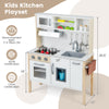 Wooden pretend play kitchen set for toddlers in white, featuring a sink, oven, and storage for imaginative play.