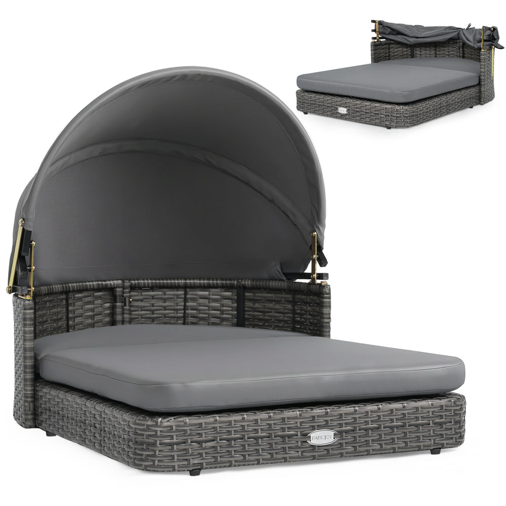 Wicker dog house in gray with adjustable canopy and two detachable cushions for small to medium dogs, ideal for outdoor lounging.