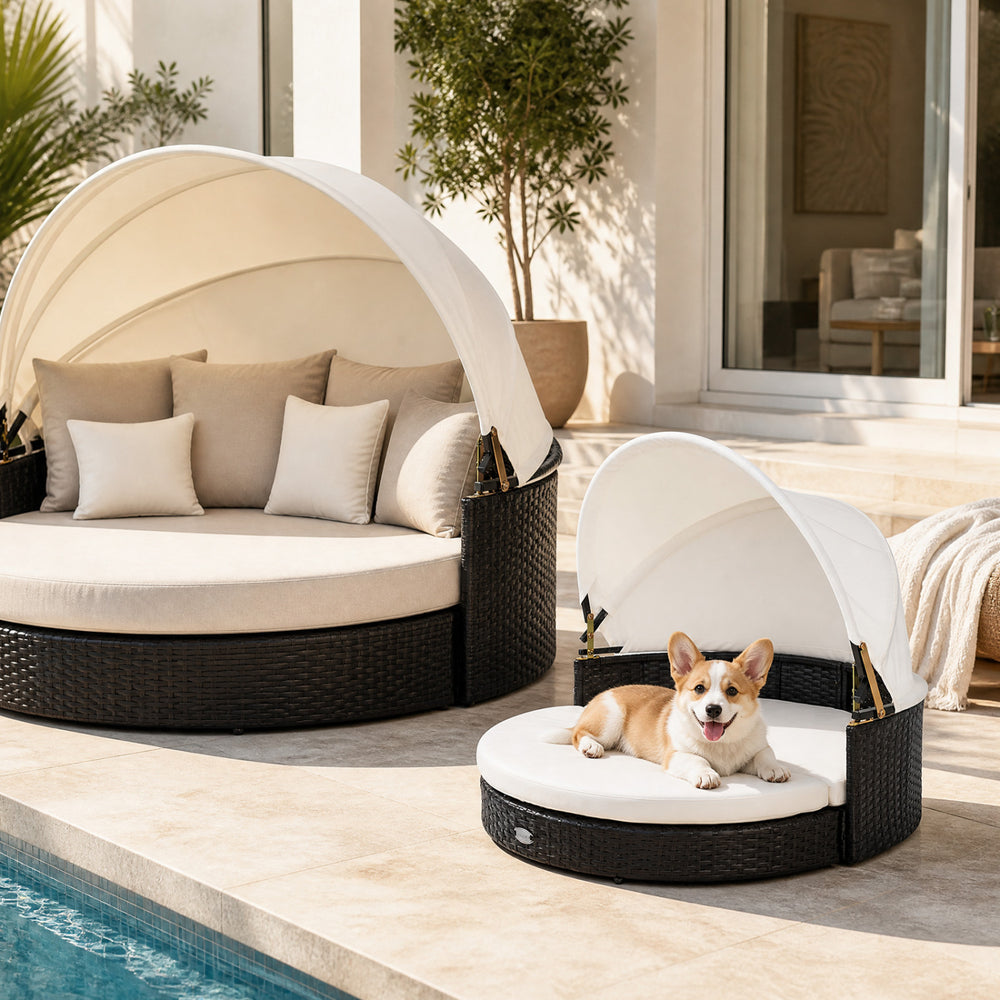 Wicker dog house with retractable canopy and removable cushion, perfect for indoor or outdoor relaxation for small to medium dogs.