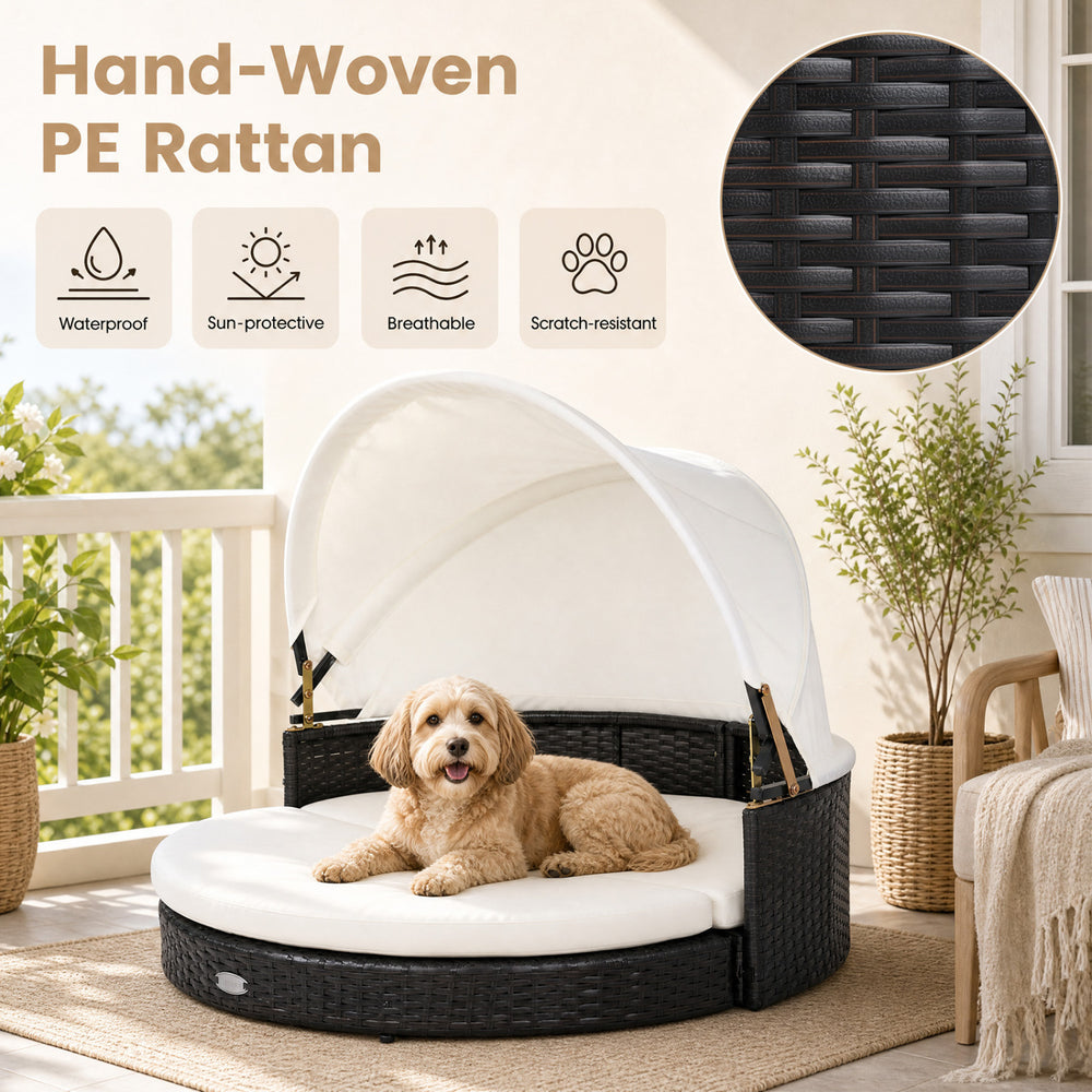 Wicker dog house with retractable canopy, removable cushion, and hand-woven PE rattan for indoor and outdoor relaxation.