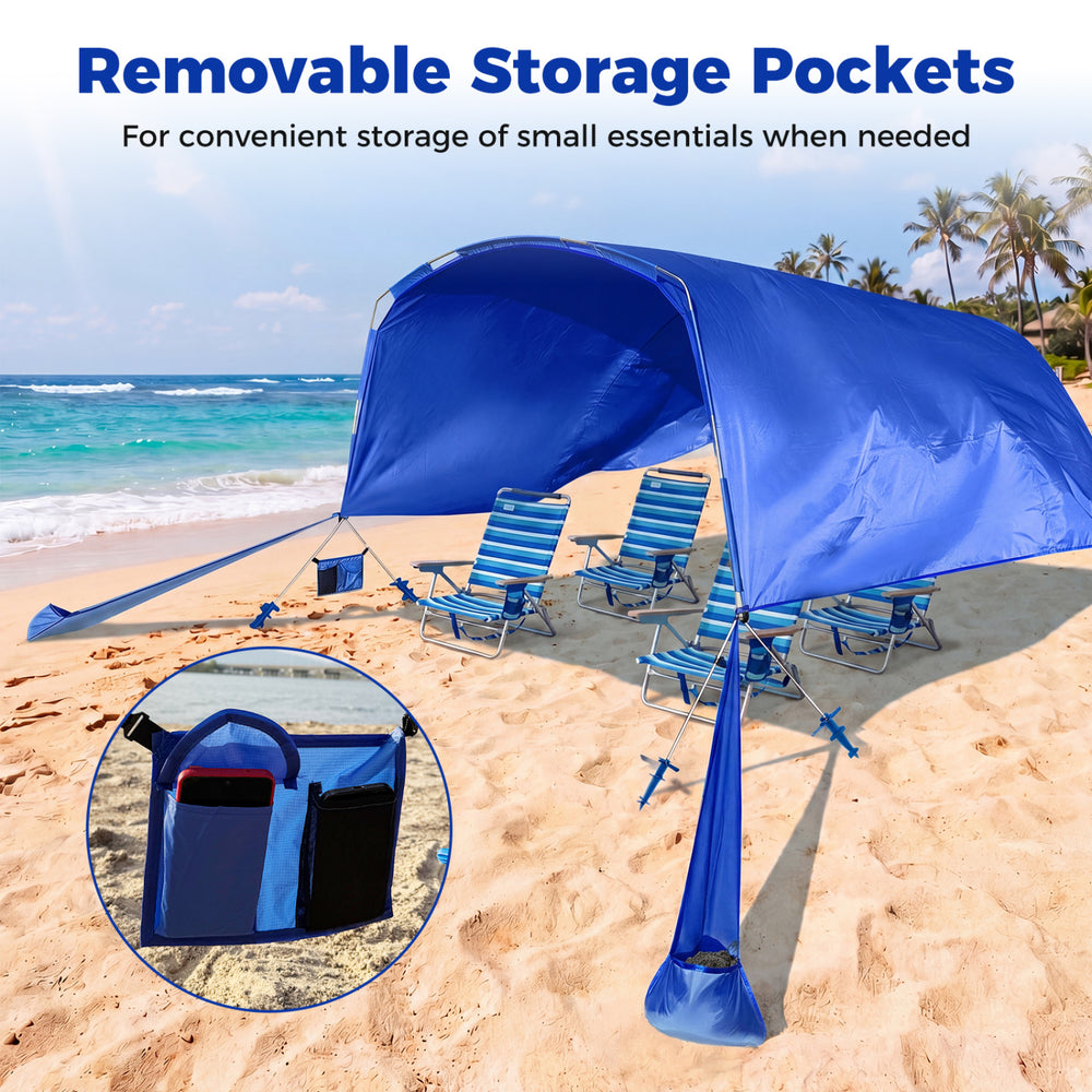 Navy wind-powered beach tent with removable storage pockets, providing shade for 6-8 people during outdoor gatherings.