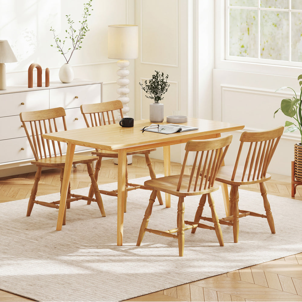 Windsor dining table set featuring natural rubber wood chairs with curved spindle backs, perfect for dining rooms or.