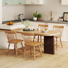 Windsor dining chairs set of 2 with curved spindle back in natural wood, perfect for dining rooms or cafes.