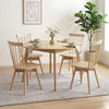 Set of four Windsor dining chairs in natural rubber wood, featuring a swivel seat and inclined spindle back for comfort.