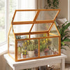 Wood cold frame greenhouse with adjustable roof, transparent panels, and solid fir wood frame for plant protection.