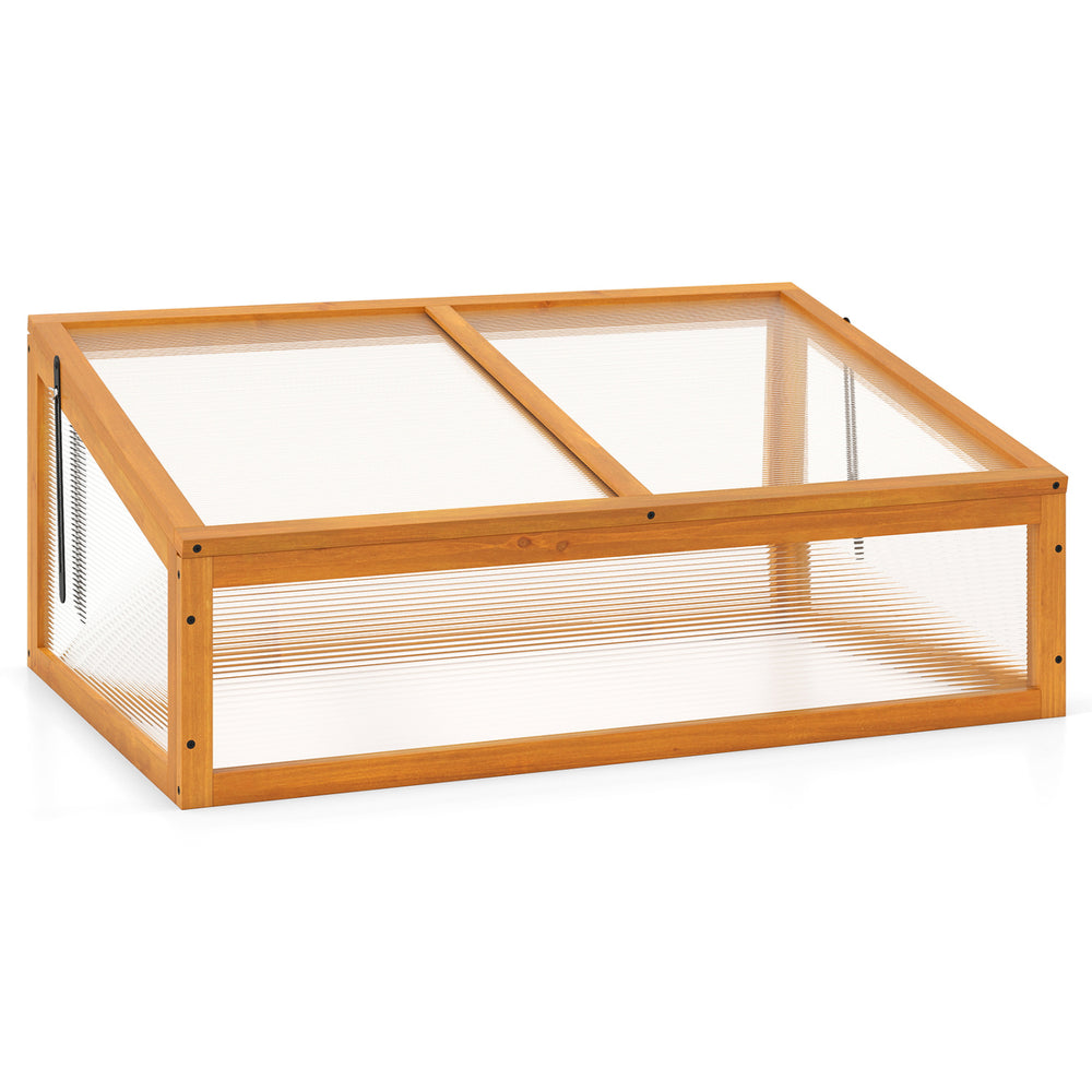 Wood cold frame greenhouse raised planter bed with transparent flip-top roof for plant protection and air circulation.