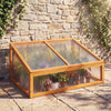 Wood cold frame greenhouse with transparent flip-top roof, made of sturdy fir wood, for protecting plants outdoors.