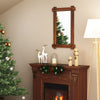 Wood framed mirror with acacia wood and vintage rivet design, enhancing rustic decor in a cozy living space.