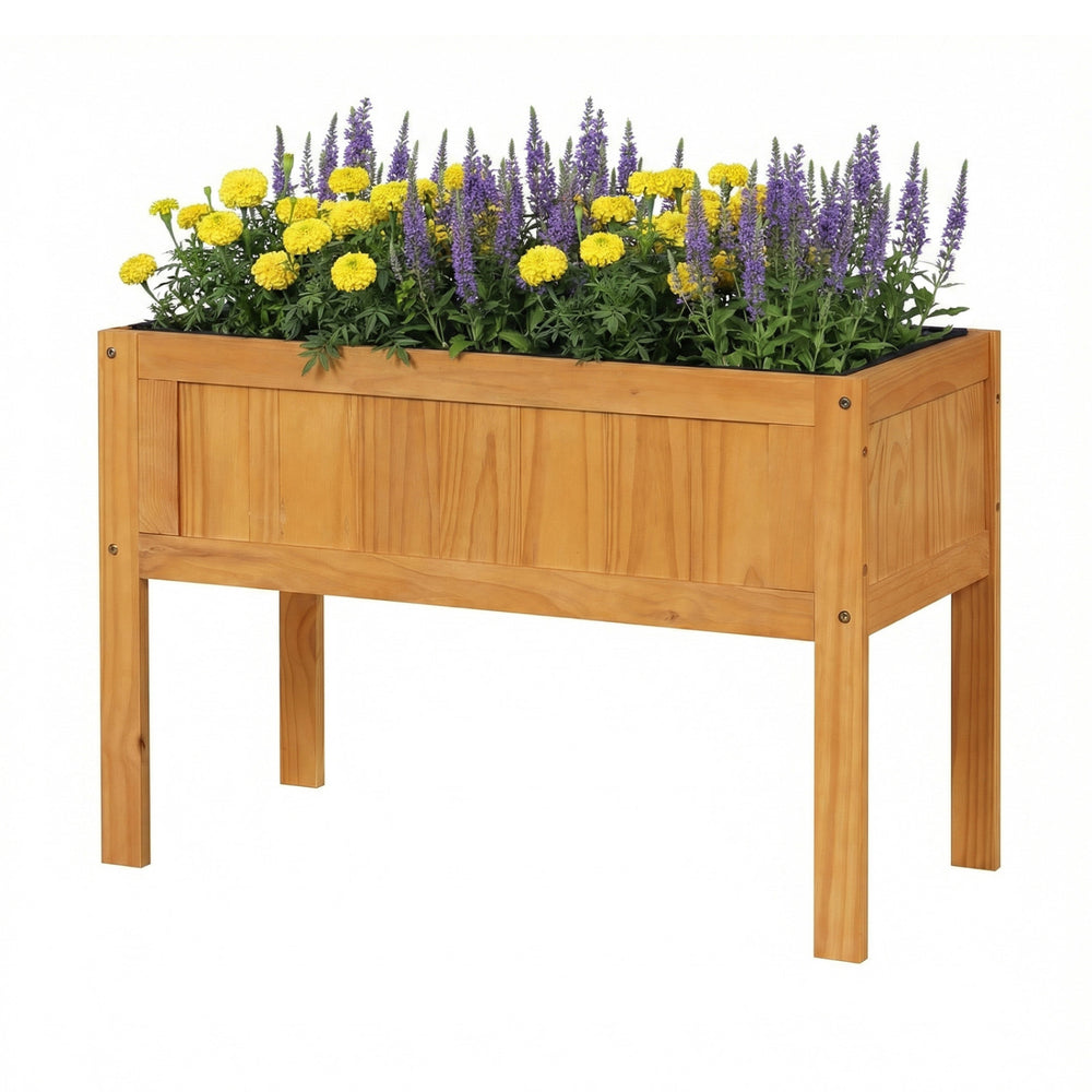 Wood raised garden bed with vibrant yellow and purple flowers, featuring drainage holes and a bed liner for optimal.