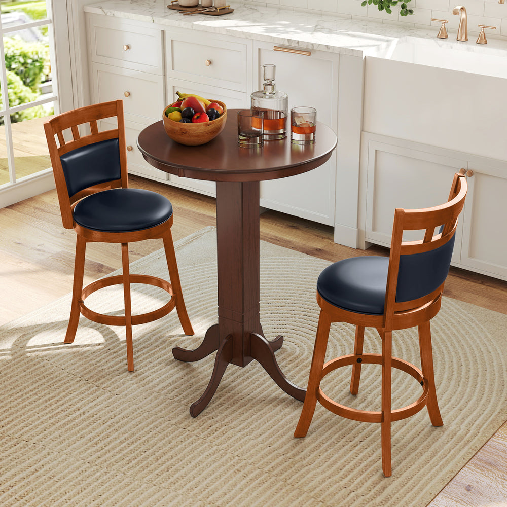 Round bar table with two wood swivel bar stools featuring faux leather seats, perfect for intimate dining or socializing.