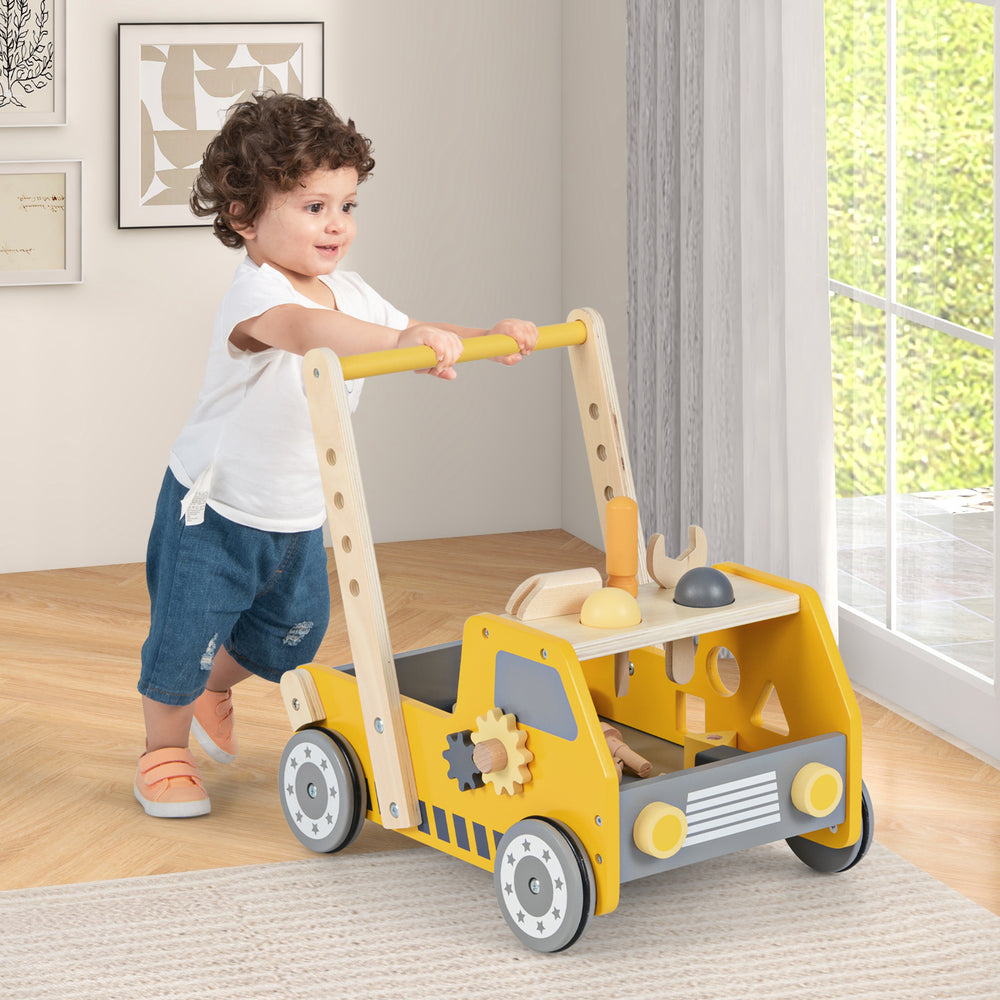 Wooden baby walker in yellow with adjustable speed, tool bench features, and bottom storage for kids over 3 years old.