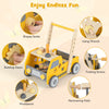 Truck-shaped wooden baby walker in yellow with adjustable speed, storage, and various interactive features for toddlers.