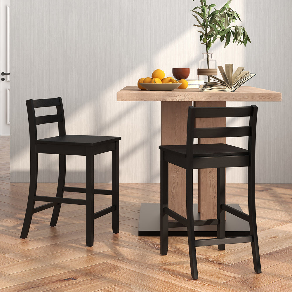 Black wooden bar stool featuring a curved backrest and footrest, ideal for enhancing comfort at home or in cafes.