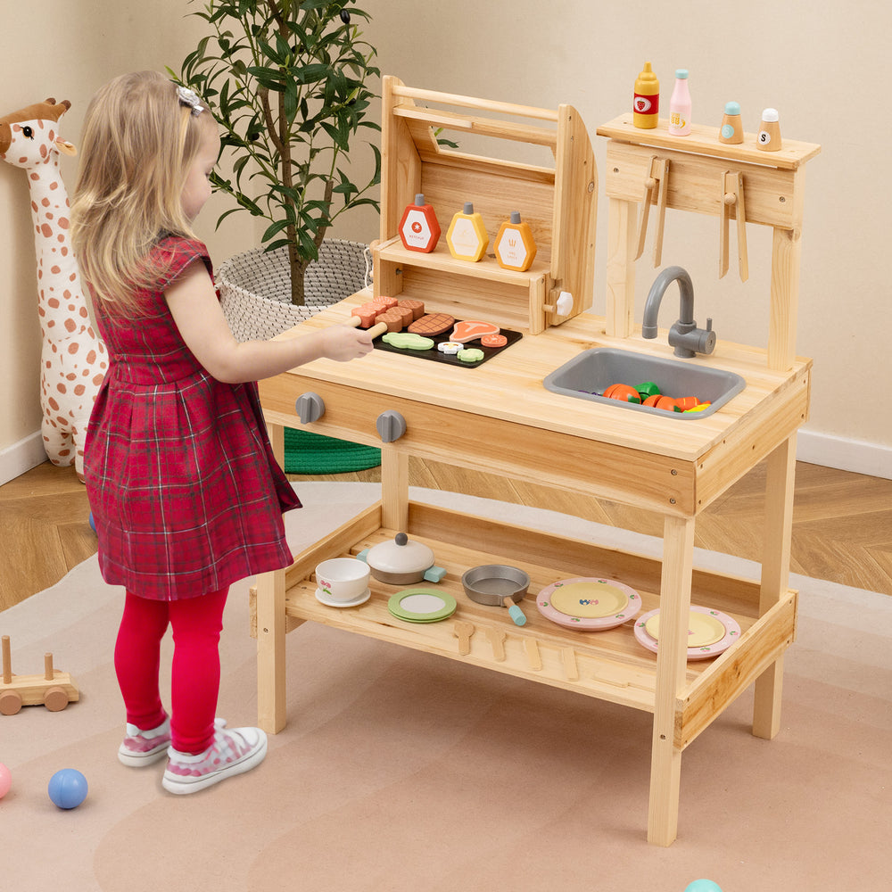 Wooden barbecue grill playset with play food, featuring open shelves and solid wood construction for kids aged 3+.
