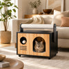 Wooden cat house with scratching post and removable cushion, designed for comfort and interactive play for your cat.