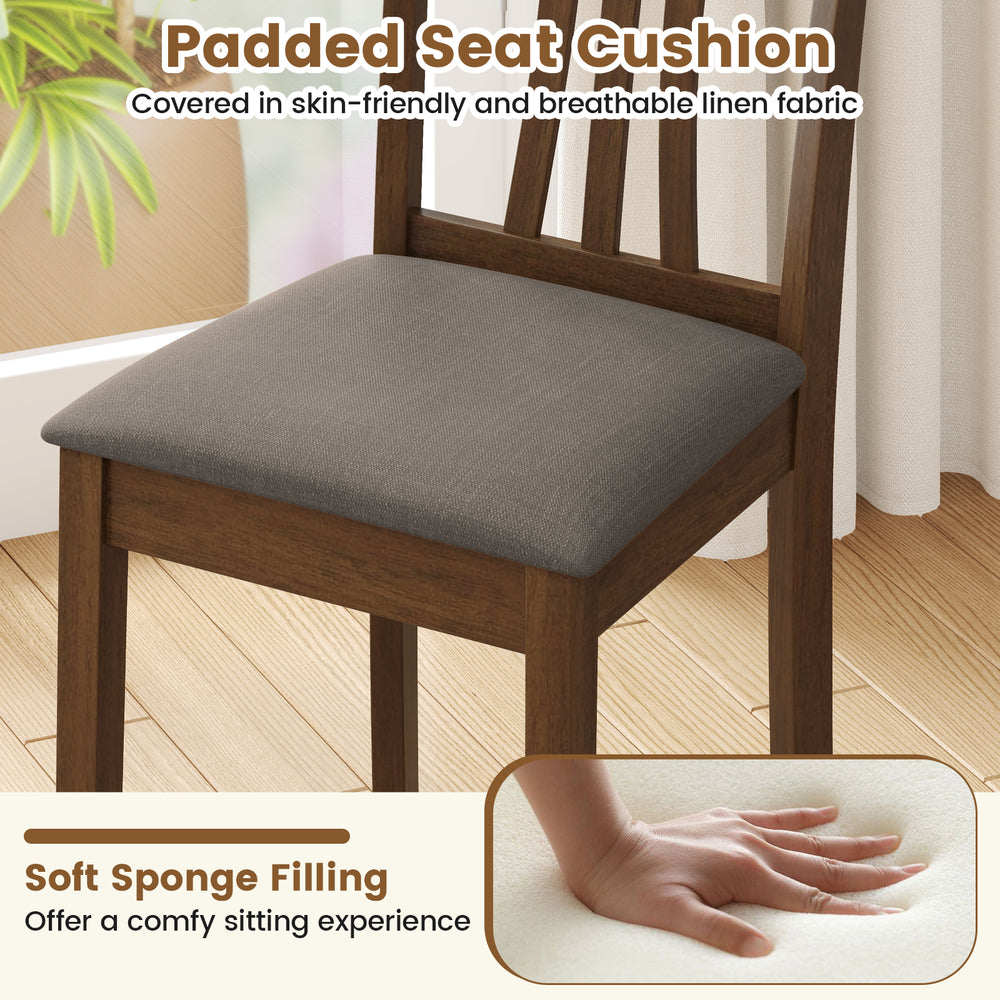 Padded seat cushion of a wooden dining chair, featuring breathable linen fabric and soft sponge filling for comfort.