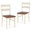 Set of 2 white wooden dining chairs with PU leather upholstery and curved backrests for comfortable seating.