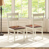 Set of 2 white wooden dining chairs with PU leather seats, perfect for home or restaurant dining areas.
