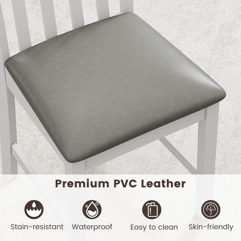 Close-up of padded seat in skin-friendly PVC leather, stain-resistant and waterproof, for wooden dining chair set.