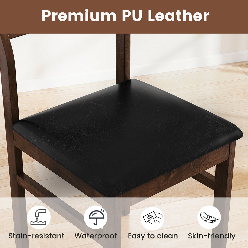 Black PU leather padded seat of a wooden dining chair, featuring a walnut frame, perfect for dining rooms and cafes.