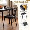 Black wooden dining chair showcasing a high spindle back, sturdy rubber wood, and protective foot pads for comfort.