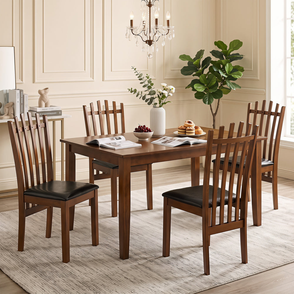 Side view of a single wooden dining chair with a spindle back and black PU leather seat, ideal for stylish dining rooms.