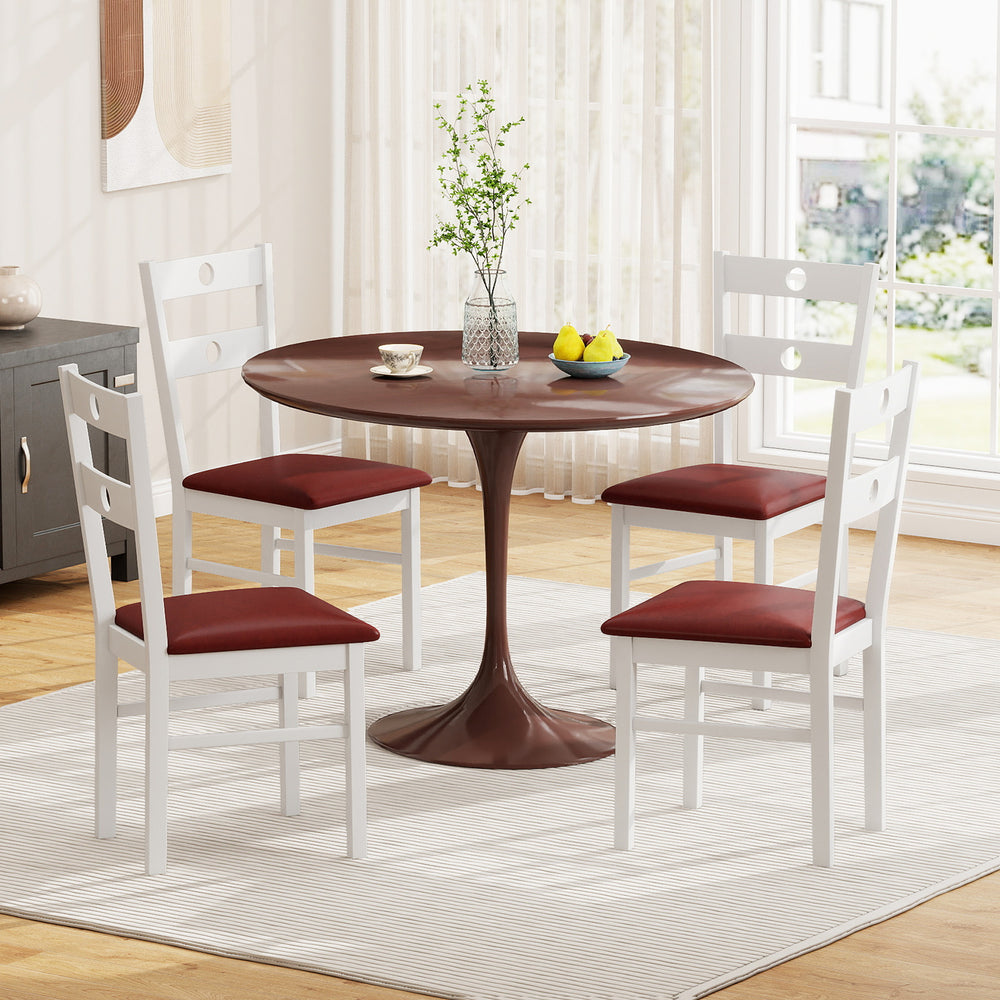 Set of 4 white armless dining chairs with hollowed backrests and waterproof PU leather seats, perfect for kitchens and.