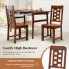 Set of 2 wooden dining chairs with curved high backrest and hollowed design, perfect for kitchen or dining room use.
