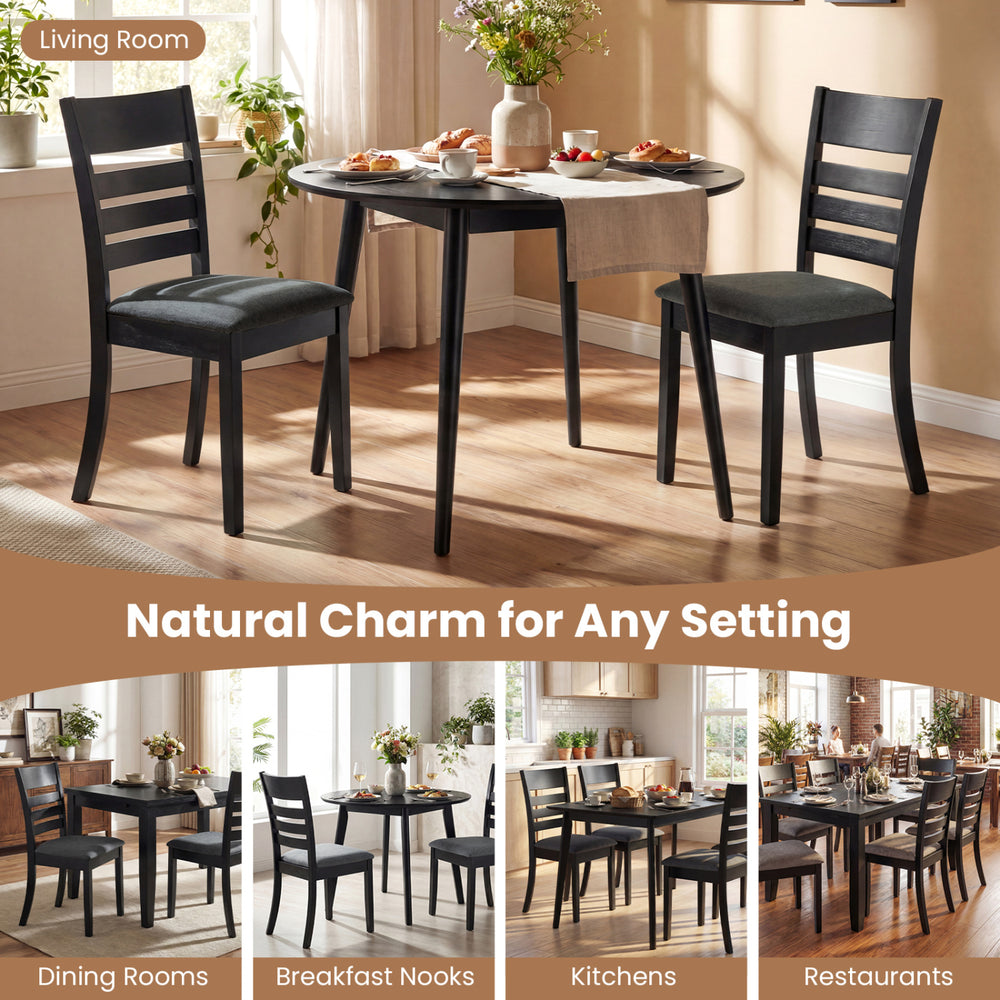 Set of 4 black upholstered dining chairs with rubber wood frame, ideal for kitchens and dining rooms.